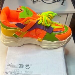 Chunky Orange and Green Sneakers with Athletic Design